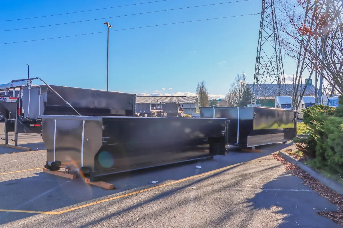 Roll-off dumpster ready for waste disposal at job site for 6 Yard Dumpster Rental in Upper Moreland